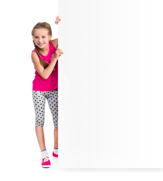 little girl holding big white blank - Foto, imagen
