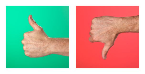 paar van thumbs up en duim omlaag tekenen op groene en rode achtergrond - Foto, afbeelding