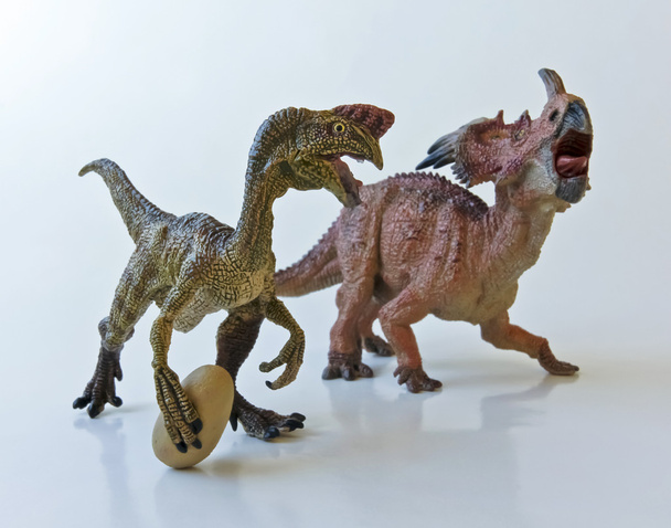 An Oviraptor Steals a Styracosaurus Mother's Egg - Photo, Image