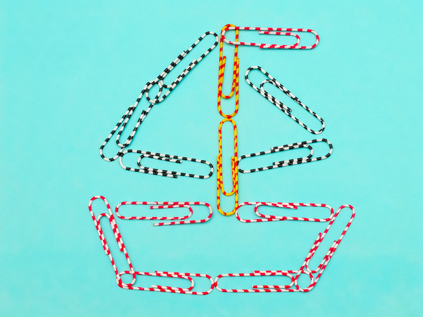 Business concept of paper clips boat - Photo, Image