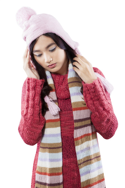 Girl wearing sweater and has headache - Fotó, kép