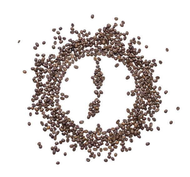 El dial del reloj con incrustaciones de granos de café tostados que muestran siete de la mañana o la noche
 - Foto, imagen