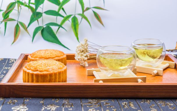 Mooncake and tea,Chinese mid autumn festival food. - Fotó, kép