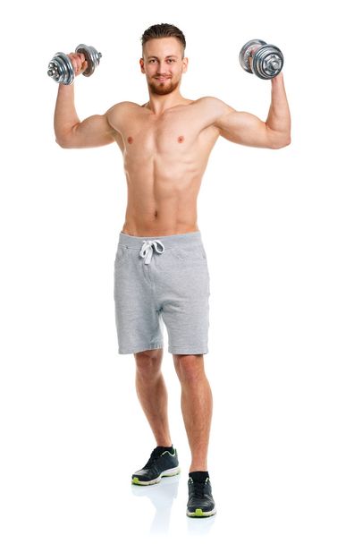 Sport man with dumbbells on the white - Photo, Image