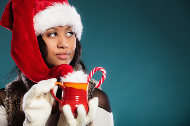 girl wearing santa helper hat - Valokuva, kuva