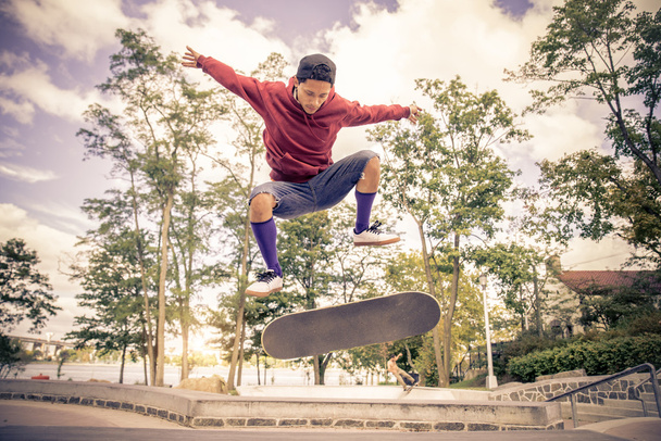 Skateboarder at skate park - 写真・画像