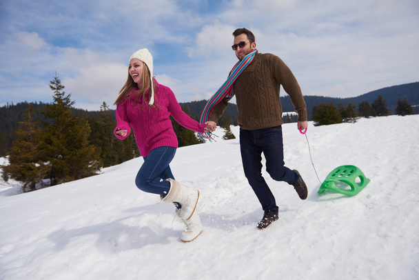 couple having fun on fresh snow - Fotografie, Obrázek