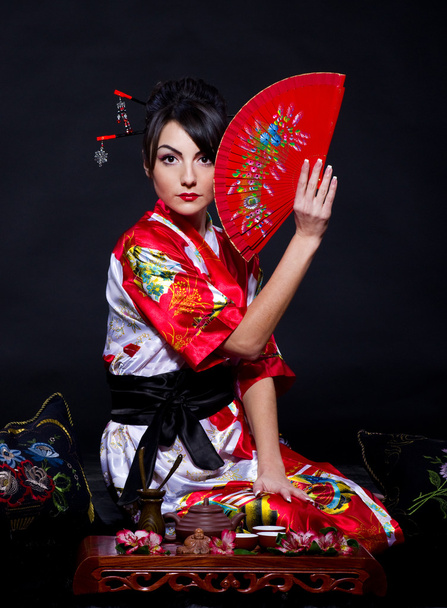 アジア赤い衣裳をつけた女 - 写真・画像