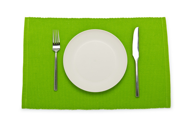 Plate and utensils served on table - Фото, зображення