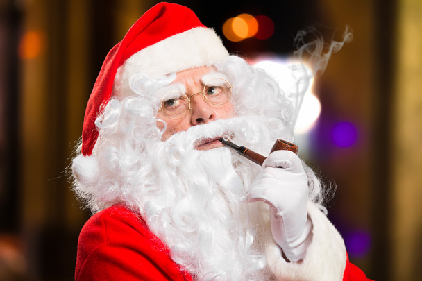 Santa Claus smoking pipe - Fotoğraf, Görsel