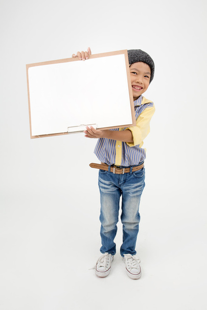 Happy Asian boy holding art board  - Foto, immagini