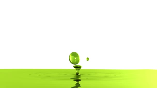 Kropla oliwy z oliwek z efektu ostrości (kropla 2) na białym tle - Materiał filmowy, wideo