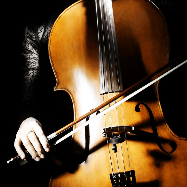 Cello musical instrument with cellist hand - Photo, Image