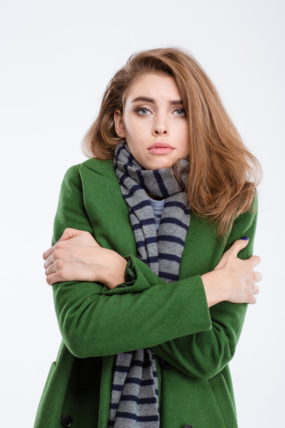 Woman in coat and scarf freezing - Fotó, kép