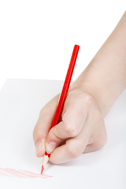 χέρι σχέδια με κόκκινο μολύβι σε φύλλο χαρτιού - Φωτογραφία, εικόνα