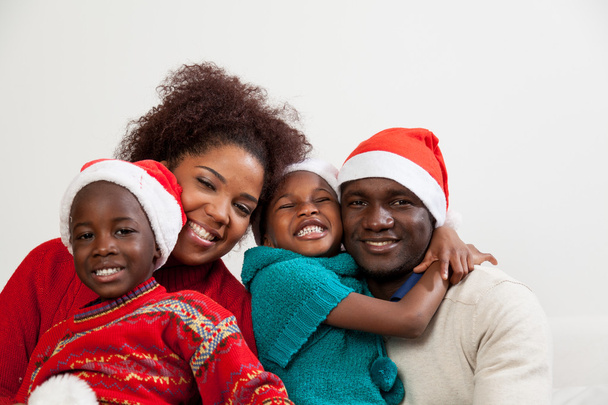 Familia africana junta en Navidad
 - Foto, imagen
