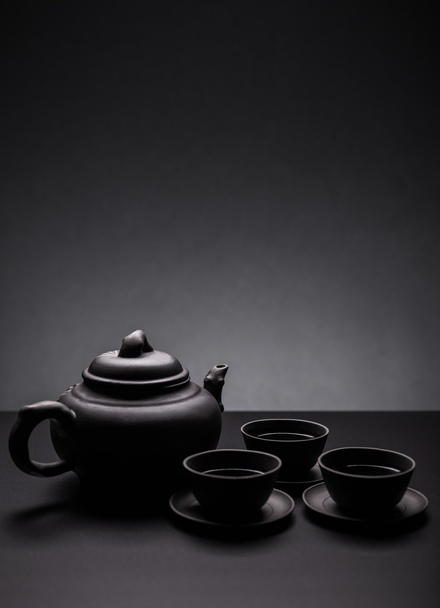 Tea set on black - 写真・画像