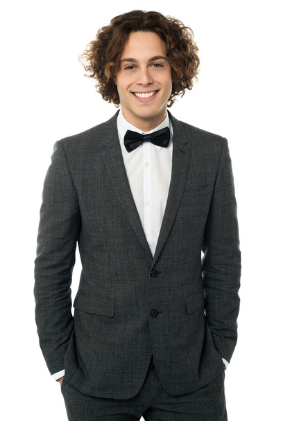 man posing in tuxedo - Фото, изображение