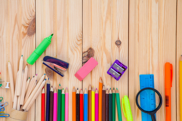 school objects isolated on a wooden background - Foto, Imagen