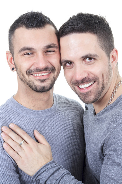 A homosexual couple over a white background - Photo, image