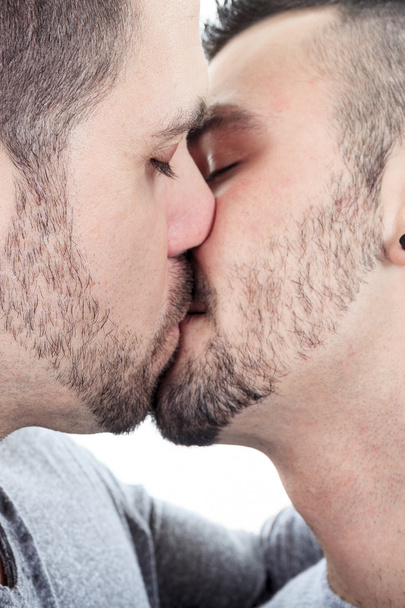 A homosexual couple over a white background - Fotó, kép