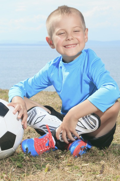 the boy with soccer ball - 写真・画像