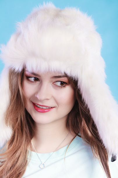 Young woman in winter clothing fur cap - Fotó, kép