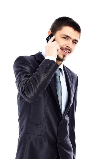 Portrait of handsome business man using cell phone, smiling - Фото, изображение