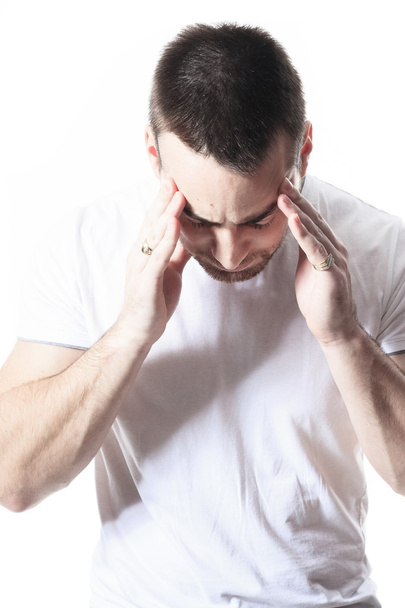 A man with a headache problem over white - Foto, Imagem