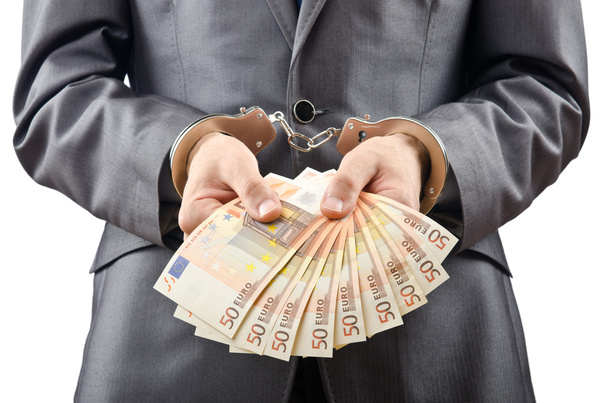 Handcuffed man with euro banknotes - Foto, Imagen