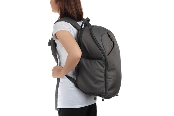 Young woman carrying with travel backpack isolated white backgro - Photo, image
