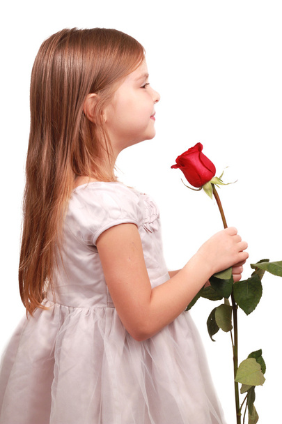 Chica encantadora con flor
 - Foto, imagen
