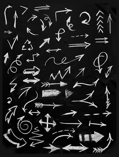 Set di frecce di gesso isolate su sfondo nero
 - Foto, immagini