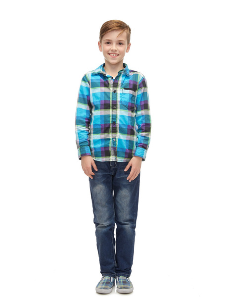 smiling boy in checkered shirt and jeans - 写真・画像