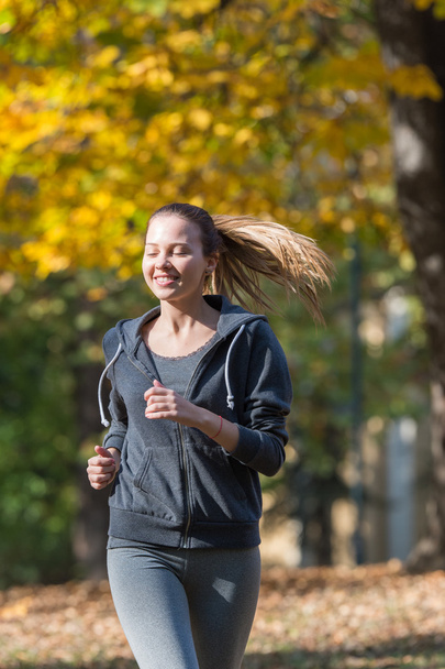 Pretty young girl  jogging - Photo, image