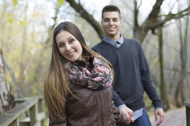 Teen couple at autumn park - Photo, image