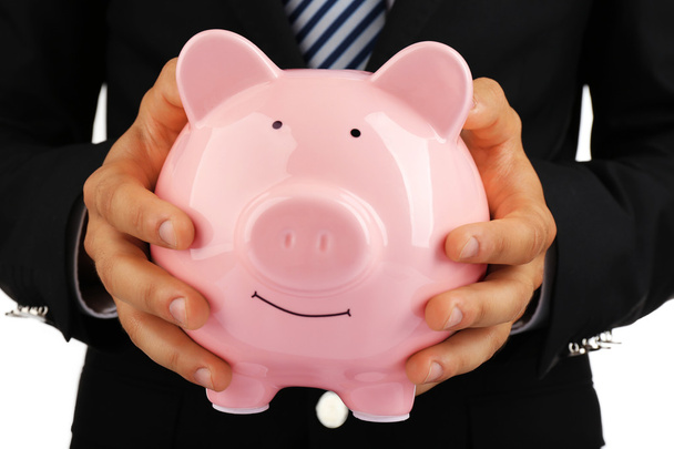 Man with piggy-bank on white background - Foto, Imagen
