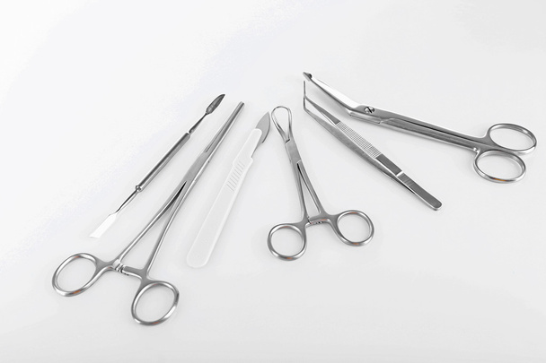 Surgery instruments isolated on white - Фото, изображение