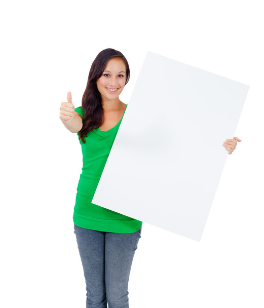 Beautiful caucasian woman holding a blank sign - Foto, afbeelding