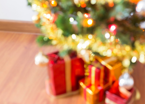 blur light celebration on christmas tree with gift box - Fotoğraf, Görsel