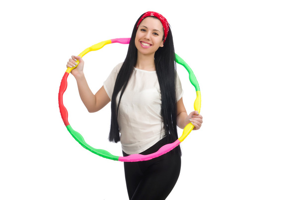 Una ragazza in tuta sportiva con hula hoop isolato su bianco - Foto, immagini