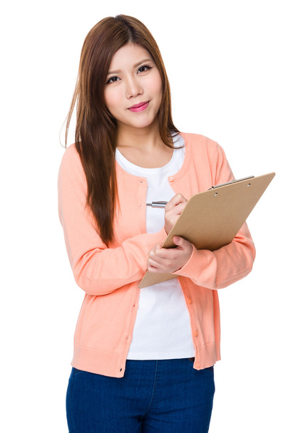 asiatische junge Frau in rosa Strickjacke - Foto, Bild