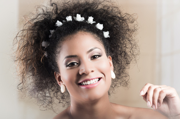 Closeup portrait of beautiful hispanic young woman with curly hair - Foto, Bild