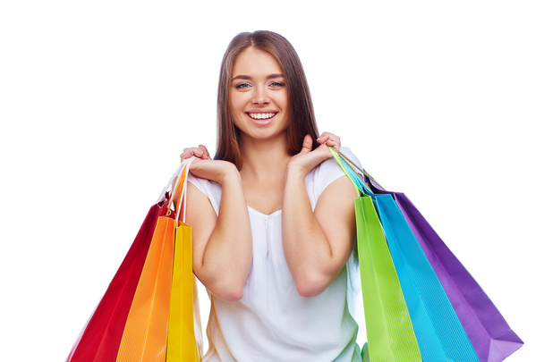 Frau hält bunten Einkauf - Foto, Bild