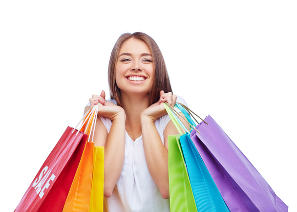 γυναίκα που κρατά πολύχρωμο ψώνια - Φωτογραφία, εικόνα