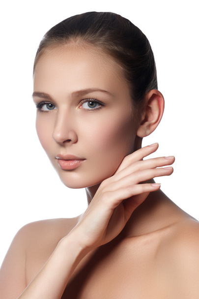 Spa woman. Natural beauty face. Beautiful girl touching her face. Perfect skin. Skincare. Young Skin. Manicured nails. Cosmetics & makeup - Foto, afbeelding