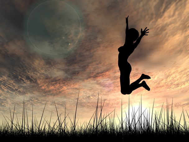 Concept or conceptual young woman or businesswoman silhouette jump happy on grass field at sunset or sunrise sky background - Photo, Image