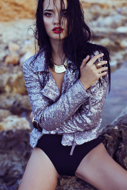 Fashion beautiful girl in silver jacket - Фото, зображення