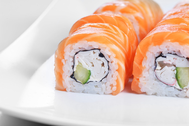 sushi with salmon on white plate - Fotoğraf, Görsel