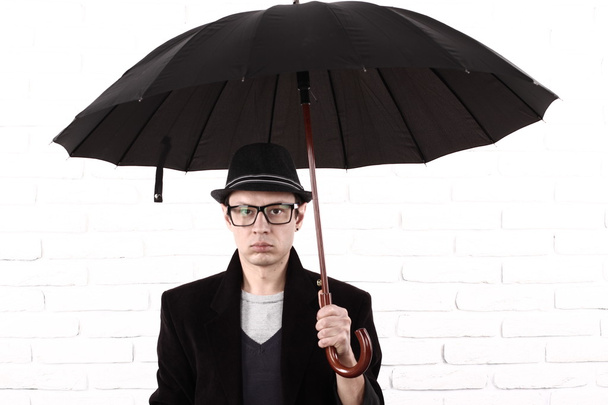 Man with an umbrella - Foto, immagini